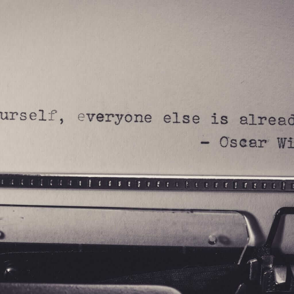 an oscar wilde quote typewritten saying be yourself, everyone else is already taken